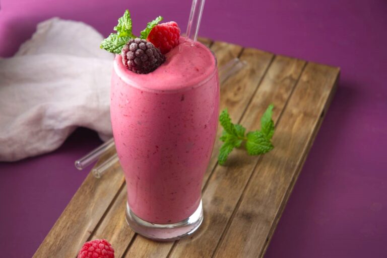 triple berry smoothie with strawberries blueberries raspberries vibrant antioxidant-rich quick breakfast