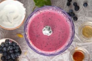 Blueberry smoothie in food processor.