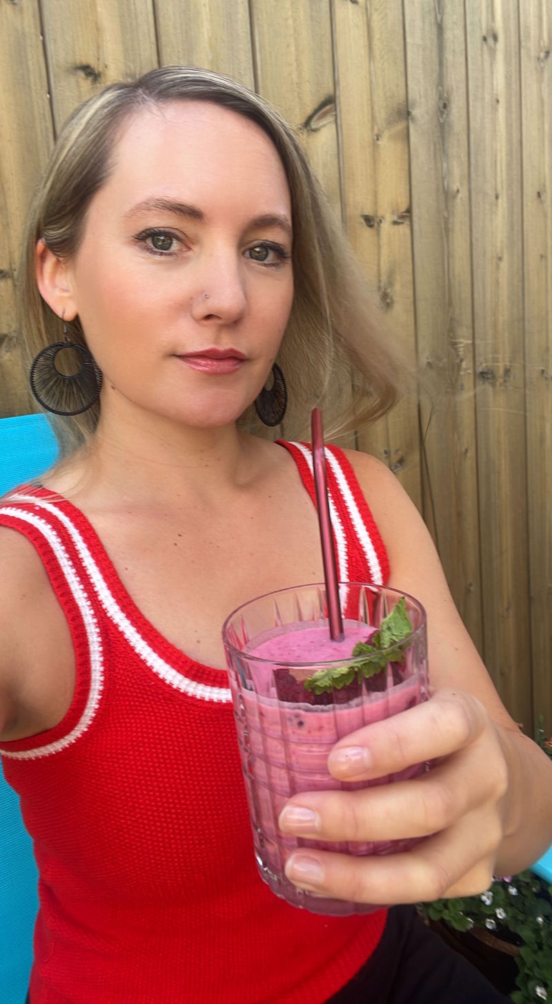 Joss Dyckson with a raspberry smoothie.