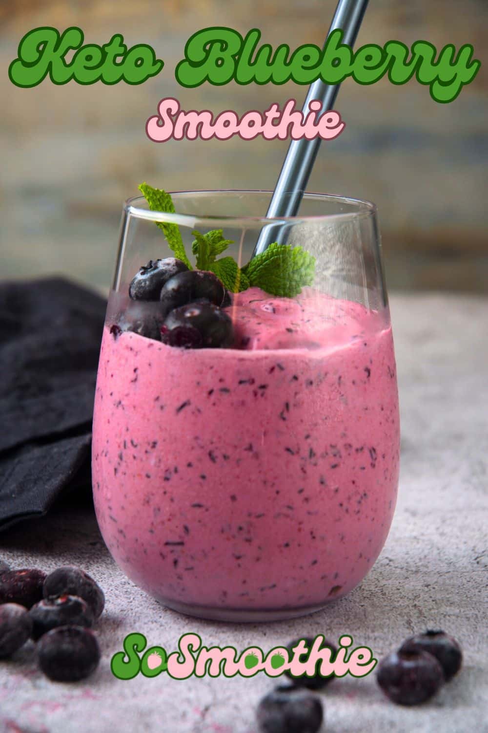 Blueberry smoothie in glass with fresh mint leaf and text overlay that says 'Keto Blueberry Smoothie'.