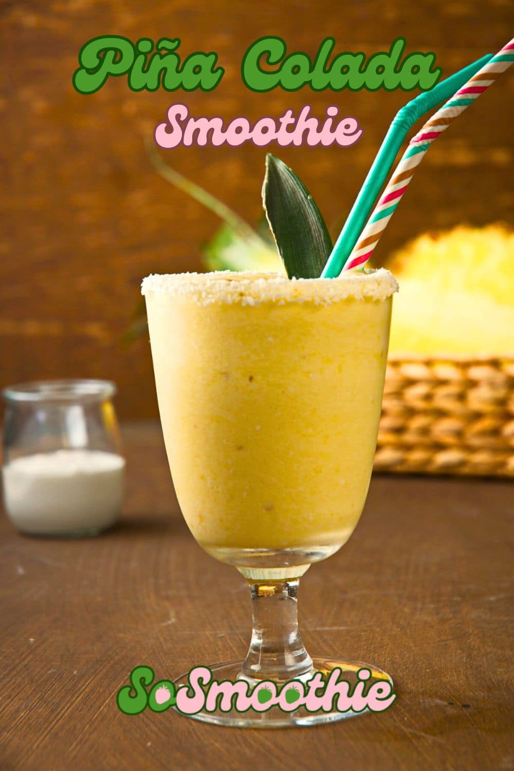 Pina Colada smoothie in glass with text overlay that says 'Pina Colada Smoothie'.