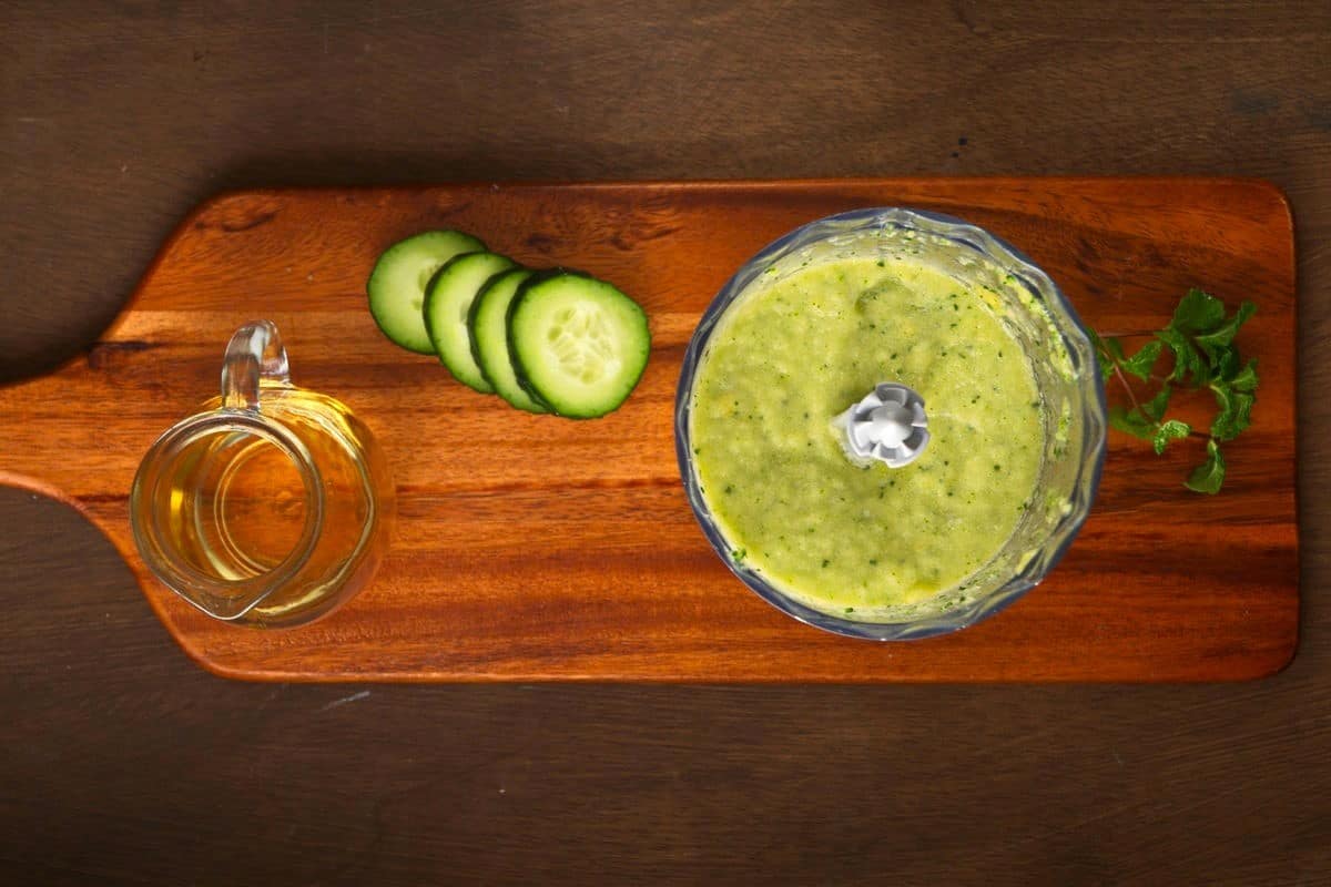 Cucumber smoothie blended in food processor.