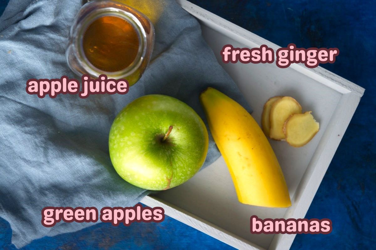 Green apple smoothie ingredients labeled on blue background.