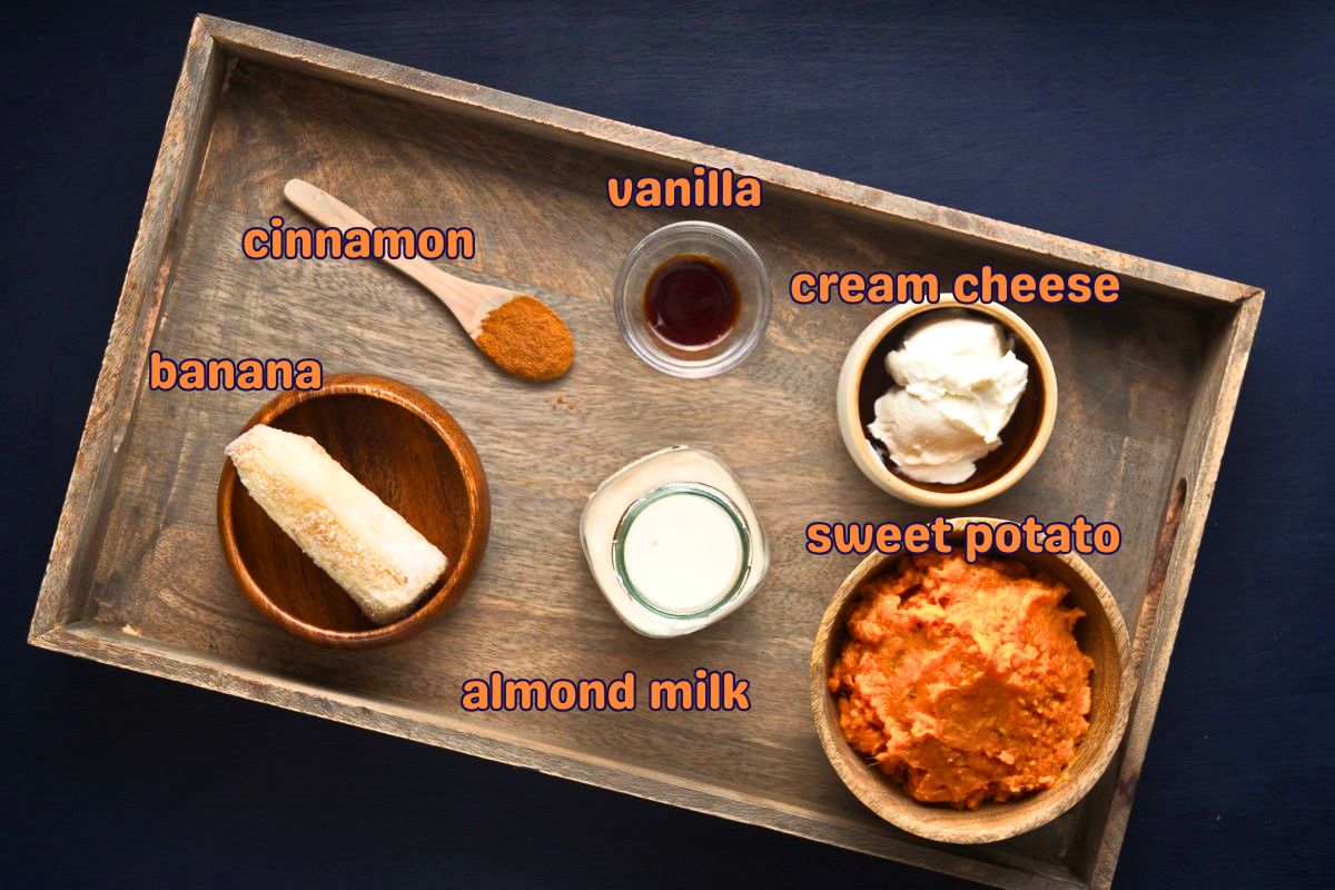 Sweet potato smoothie ingredients labeled on navy blue background.