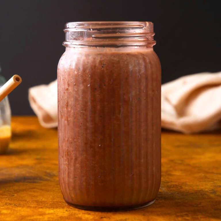 Chocolate zucchini smoothie in glass.